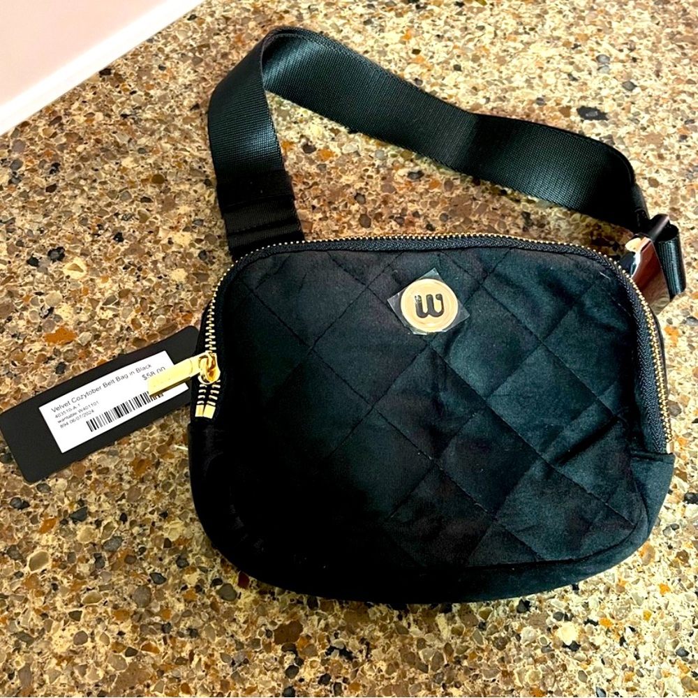 NEW W by Wantable 
Quilted Black Crossbody Bag
Adjustable buckle
Travel resort